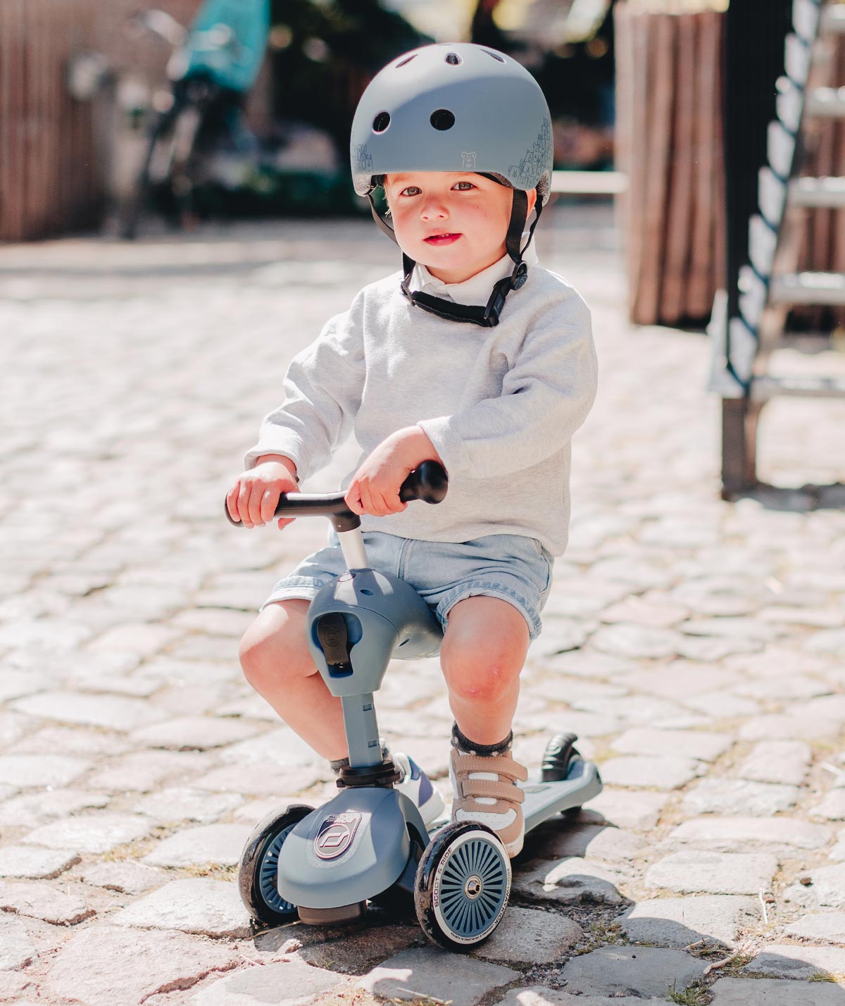Child riding the Scoot and Ride Highway Kick 1 Steel
